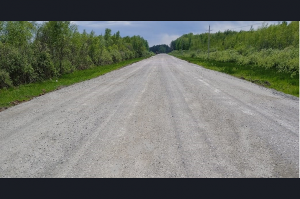 Протяженный участок важнейшей для Кыштовского района дороги отремонтировали по БКД досрочно
